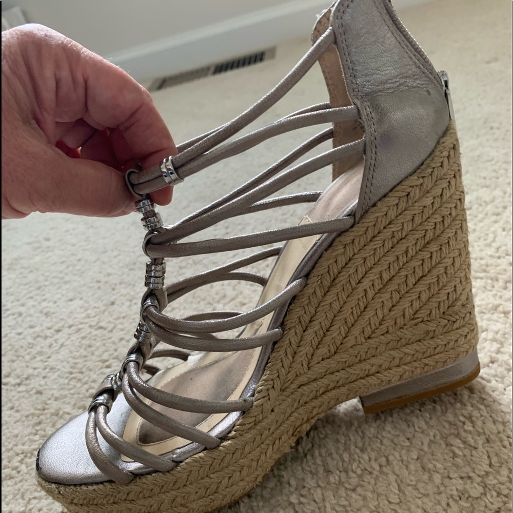 Grey/silver strapped sandals.